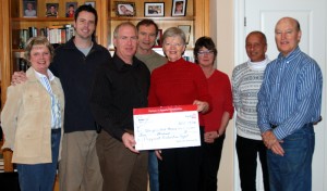 spa_hydro1_donation The Sturgeon Point Association's Lynne Manning accepts a $5000 cheque from Jack Steele of Hydro One.